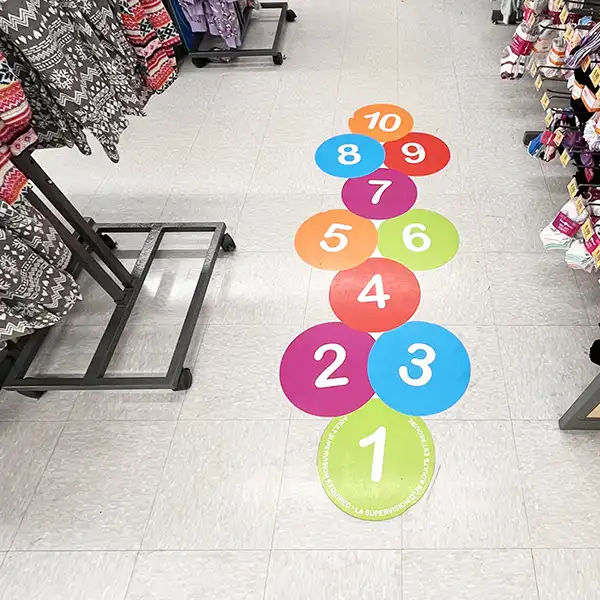 Autocollant pour plancher de magasin